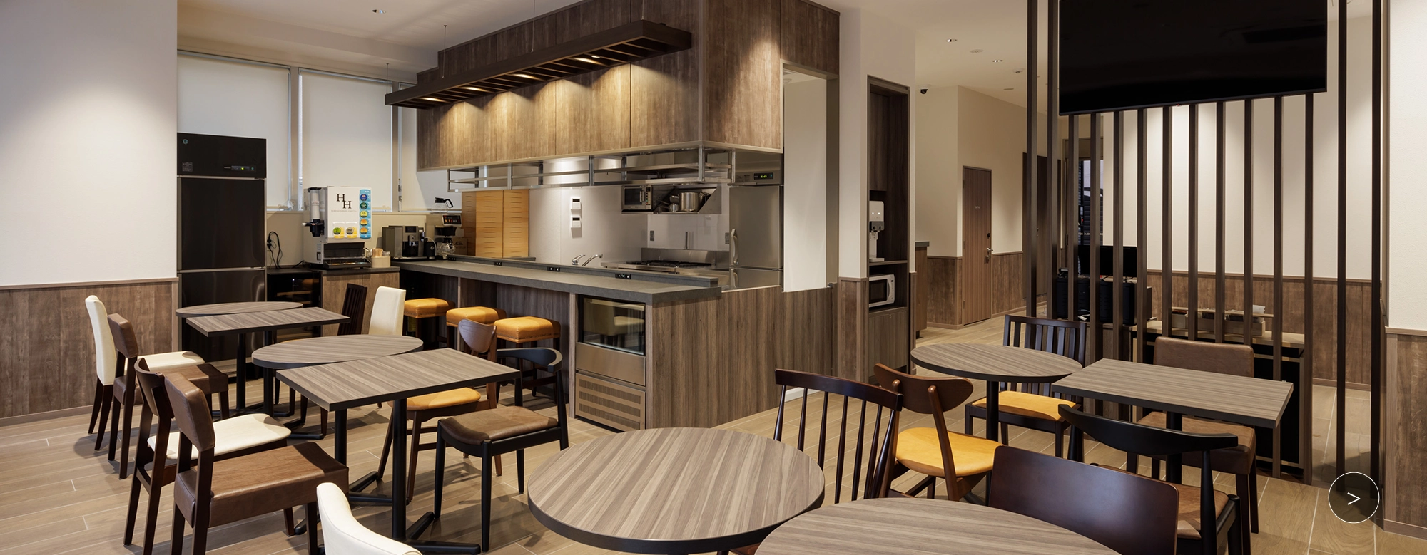An open cafe and bar with terrace seating